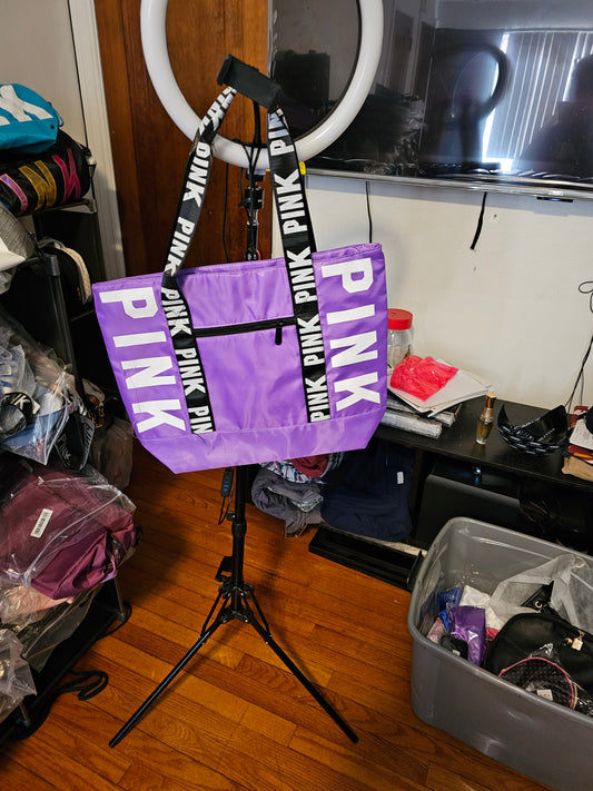 Purple shoulder bag.